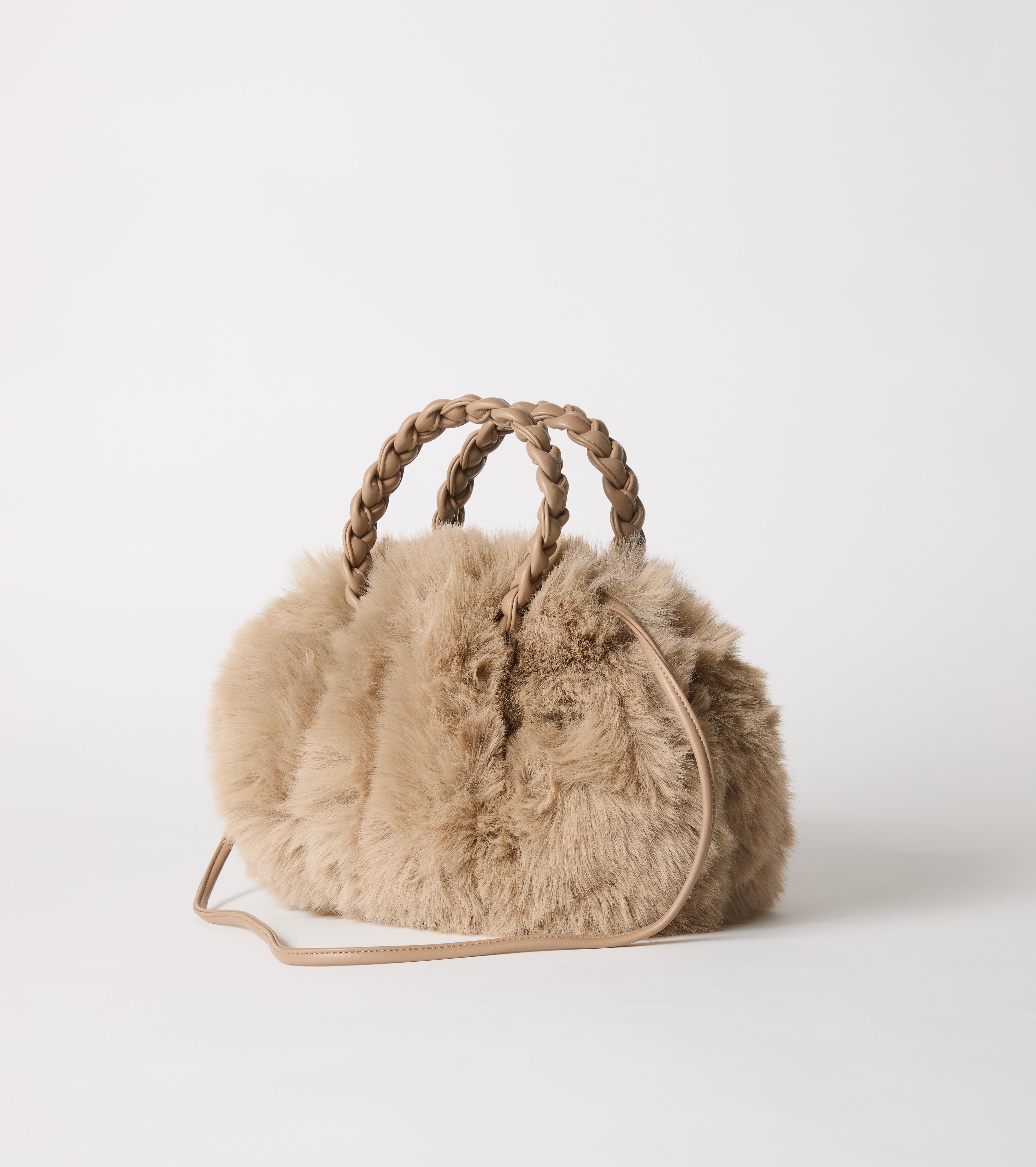 Faux fur bag with woven handles