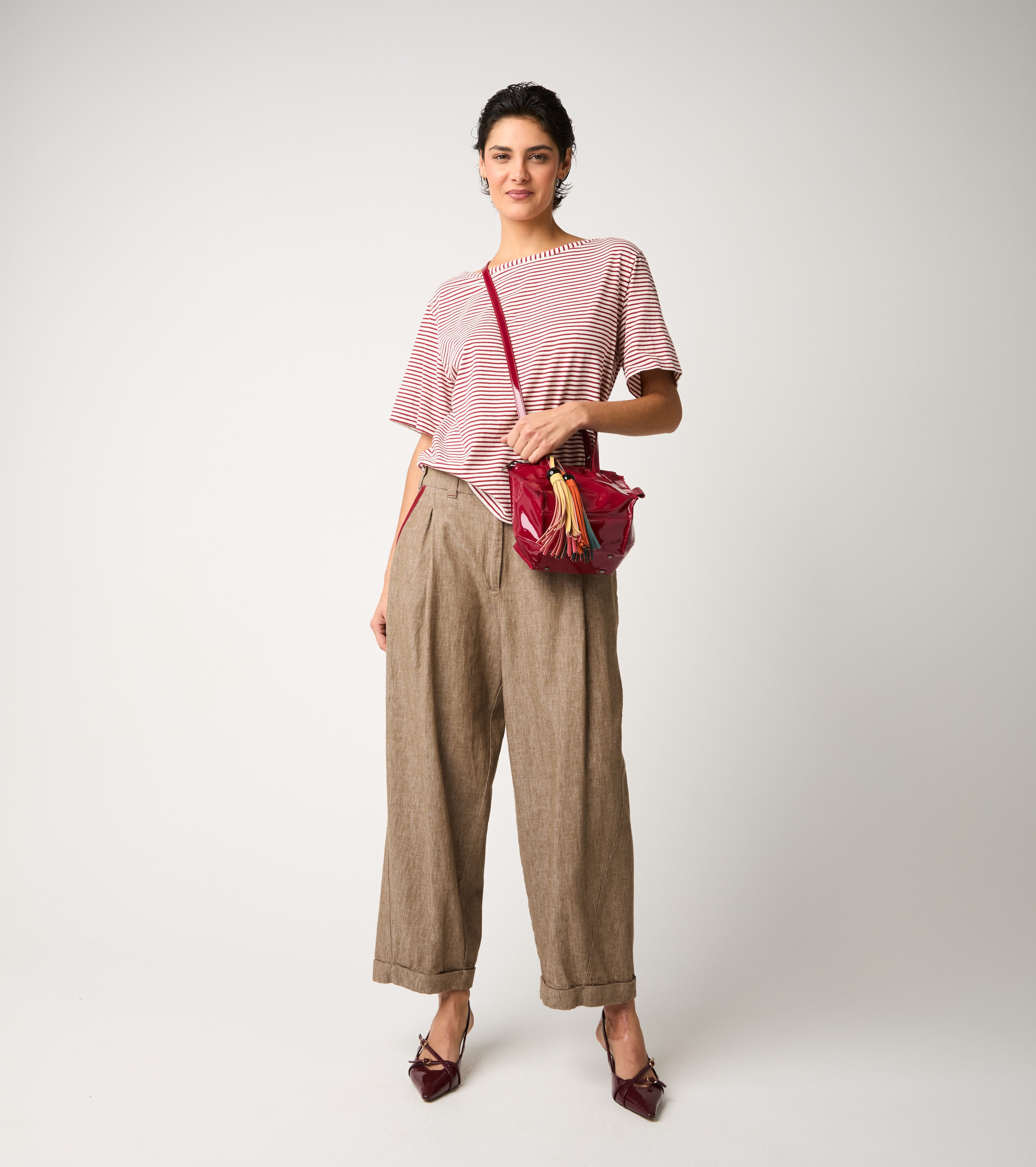 Pantaloni con pinces e risvolto castoro