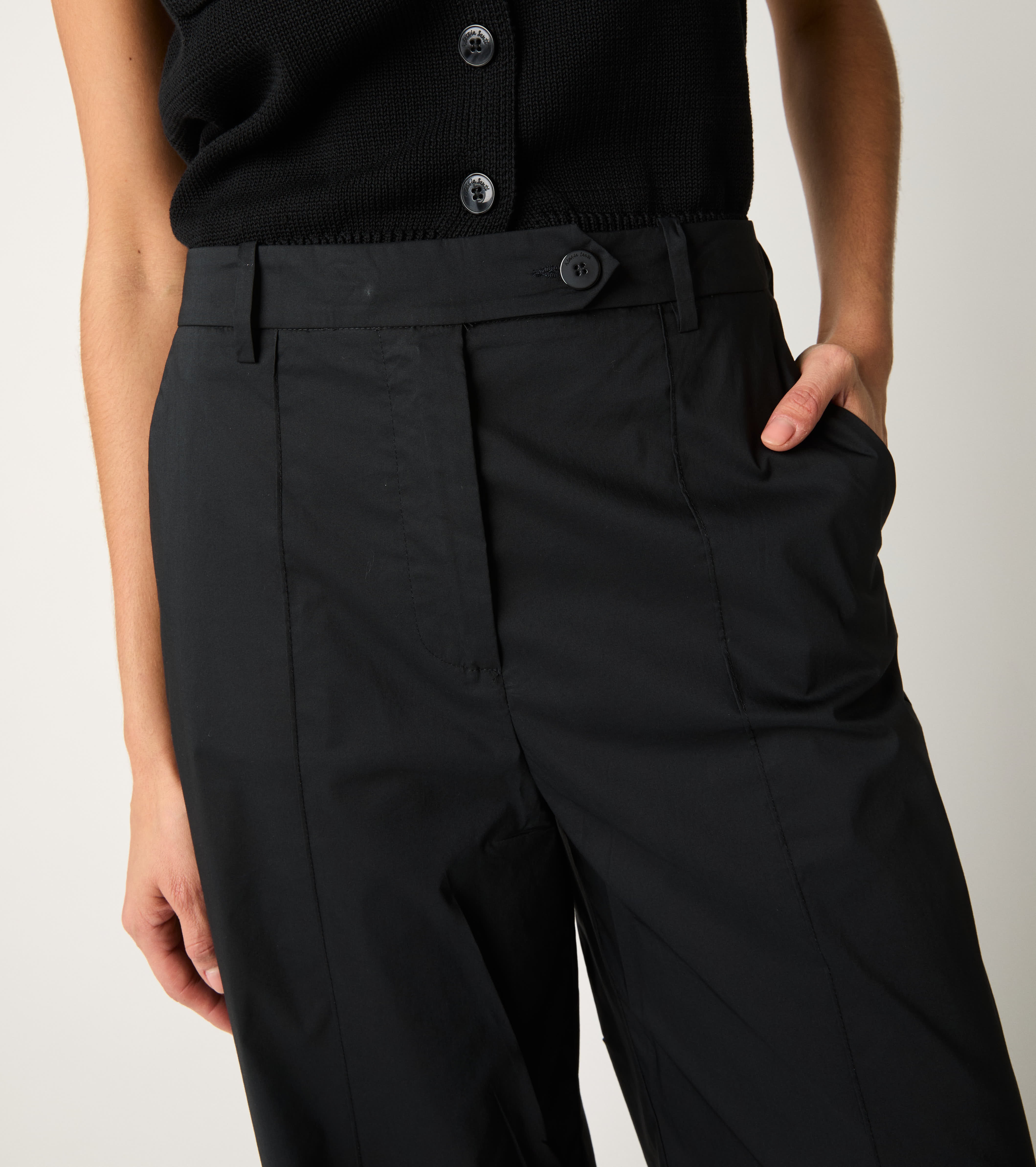 Trousers with pleat and black lapels