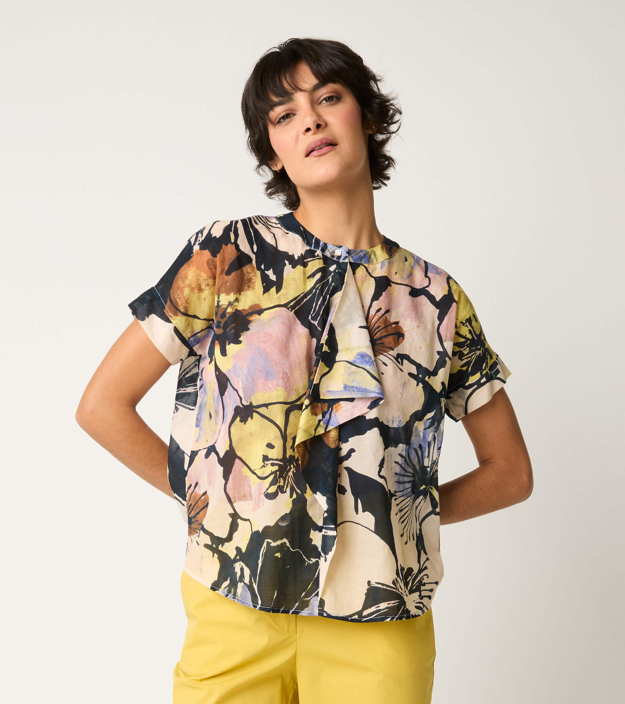 Crew-neck blouse with flower ruffles