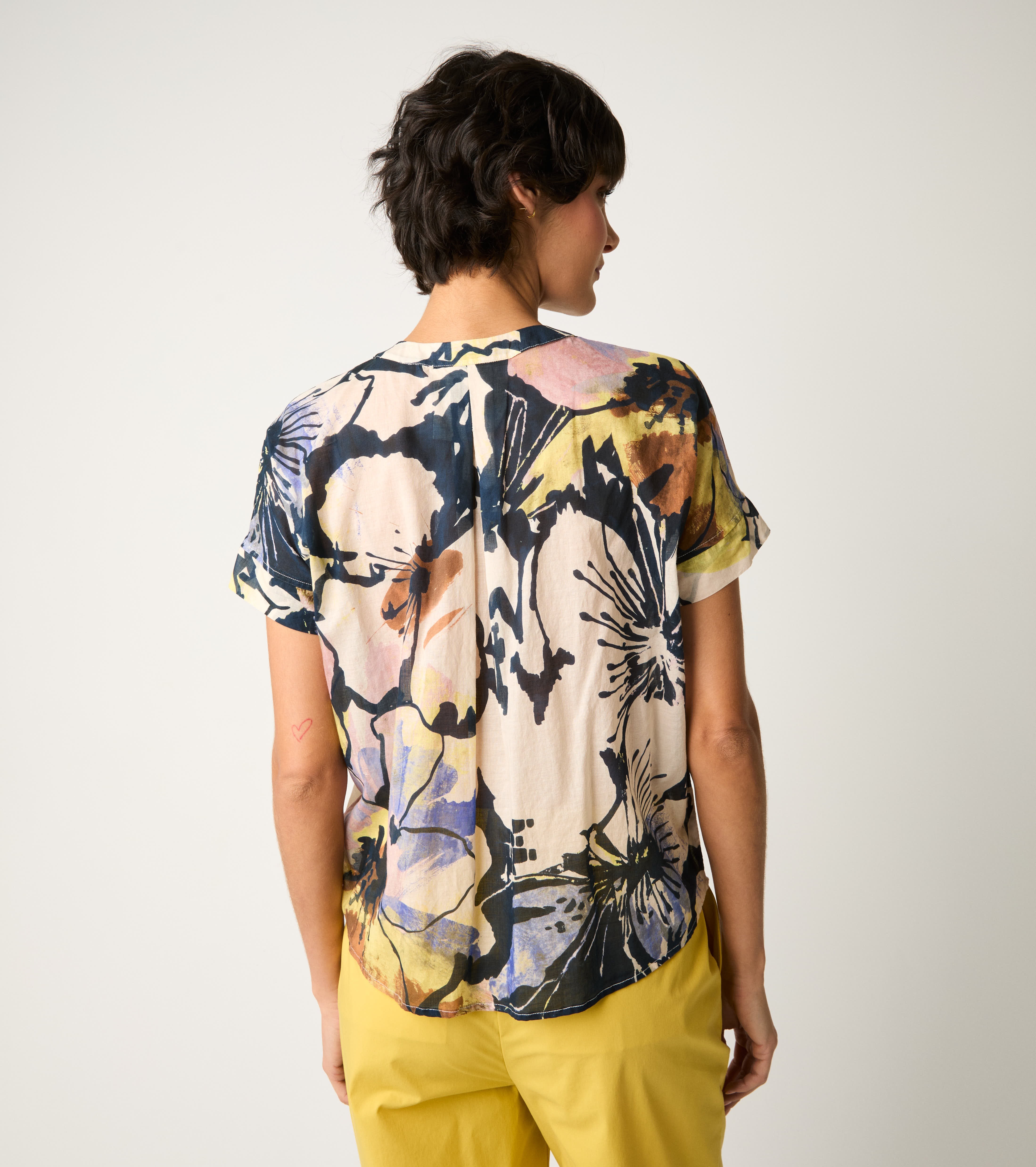 Crew-neck blouse with flower ruffles