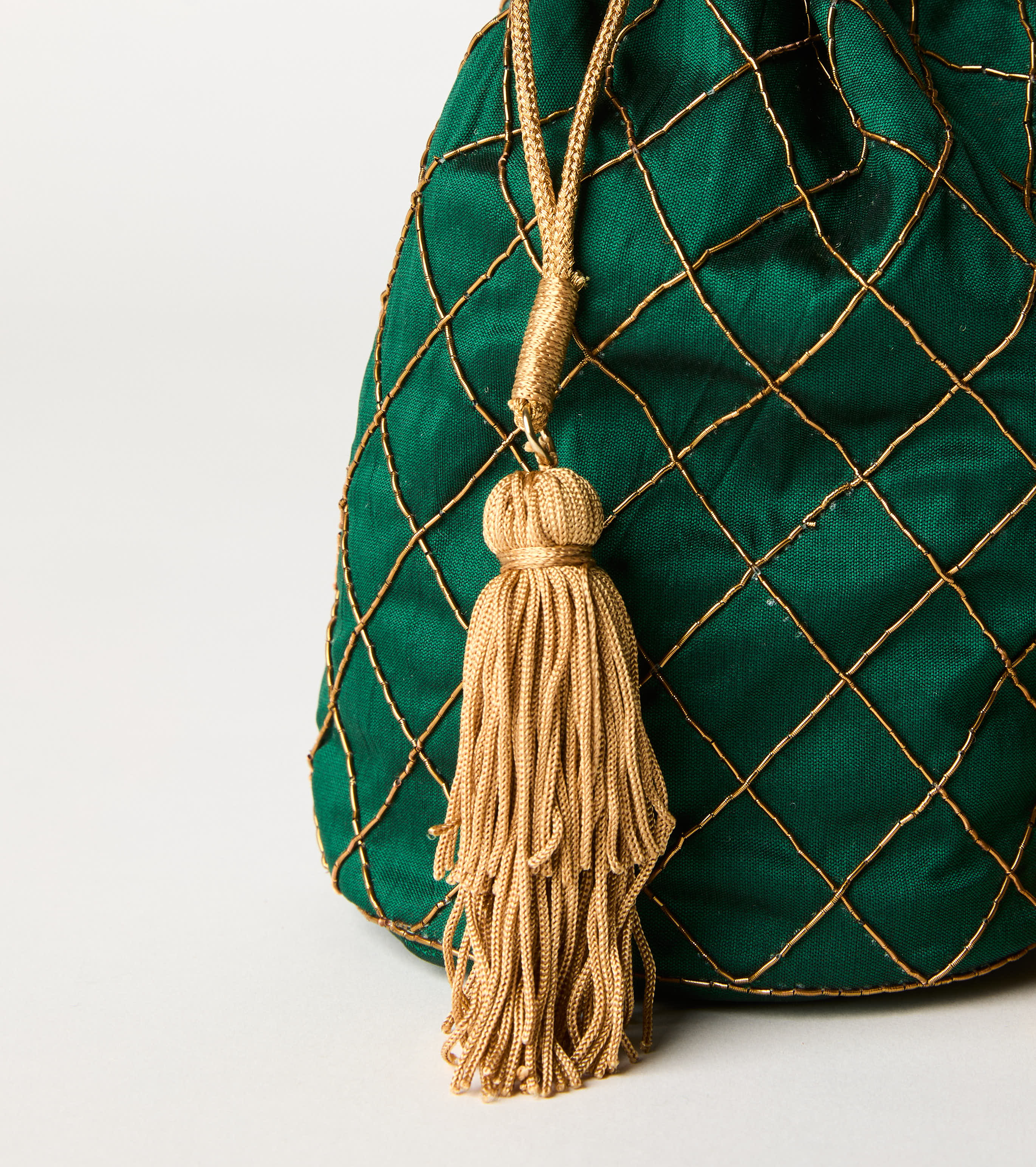 Lurex bucket bag with sage tassels
