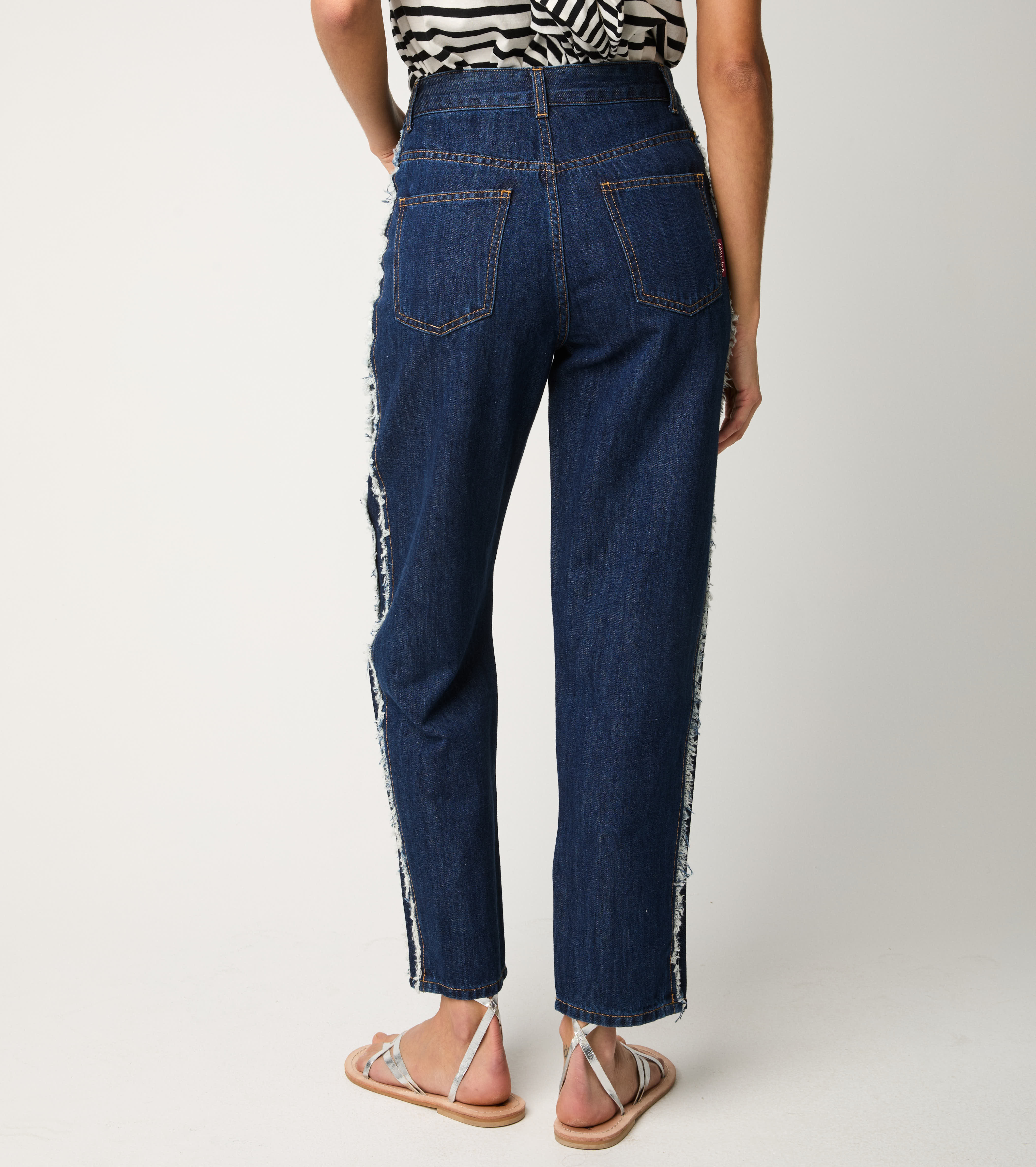 Jeans cinque tasche sfrangiato unico
