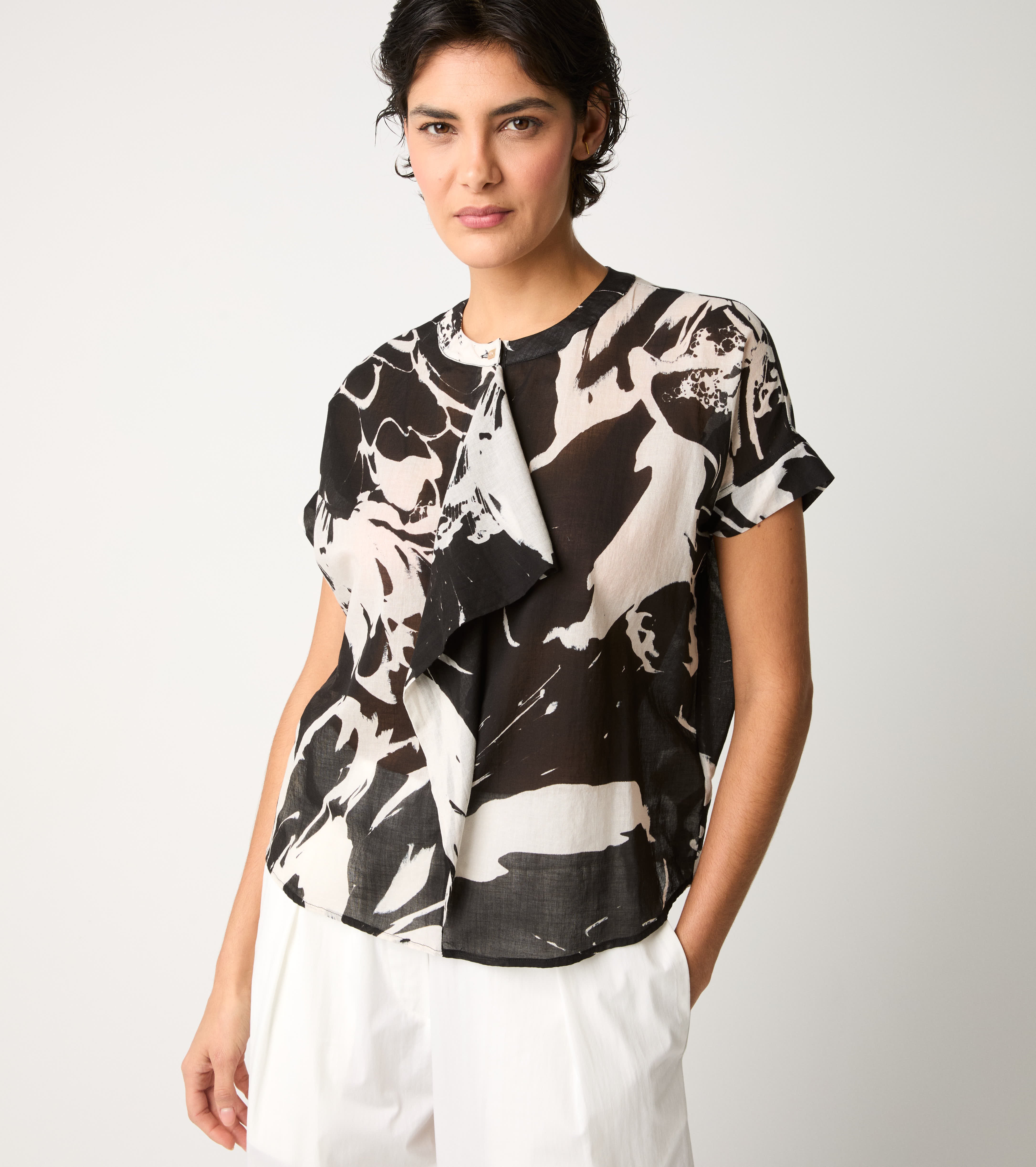 Crew-neck blouse with flower ruffles