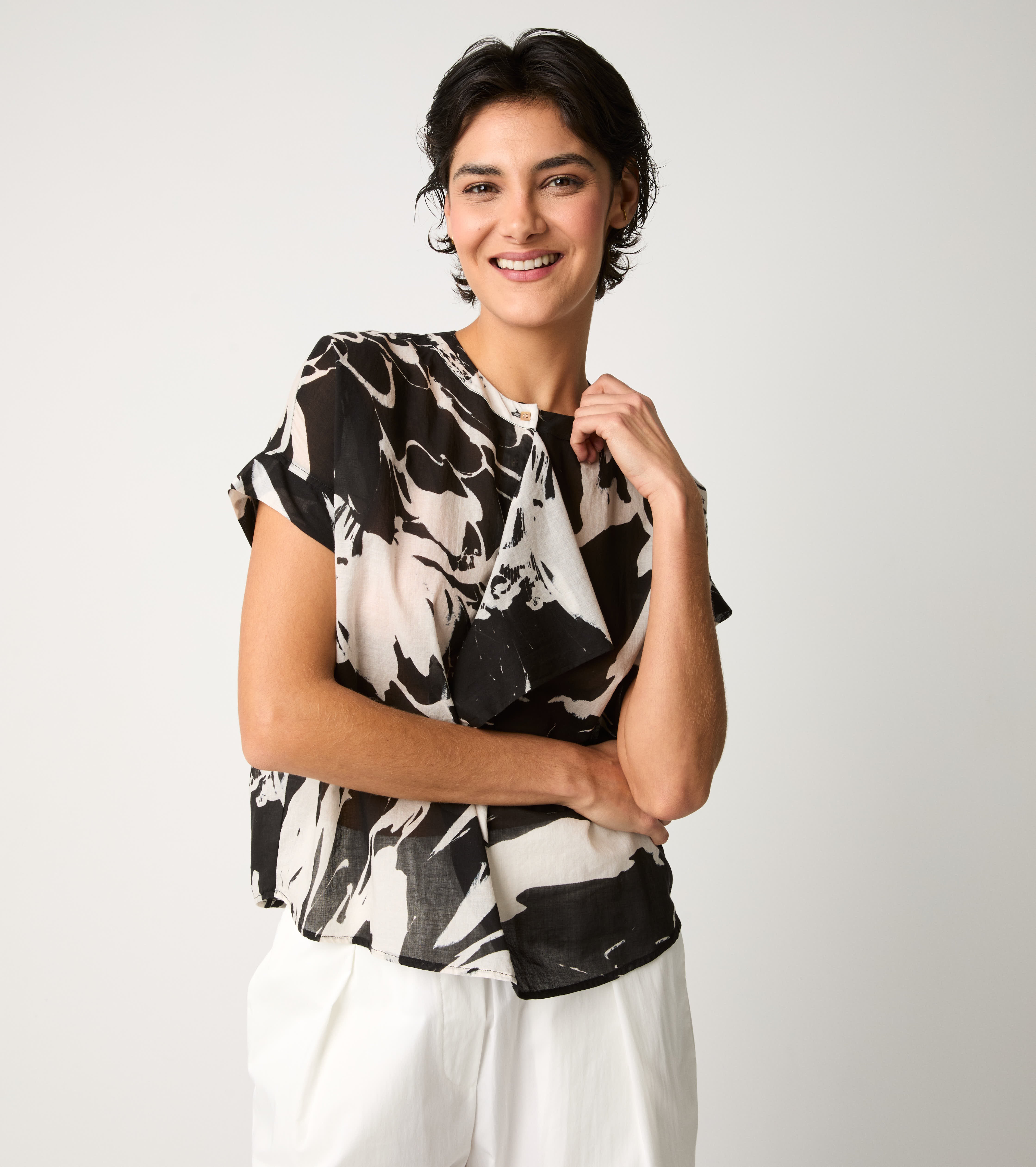 Crew-neck blouse with flower ruffles