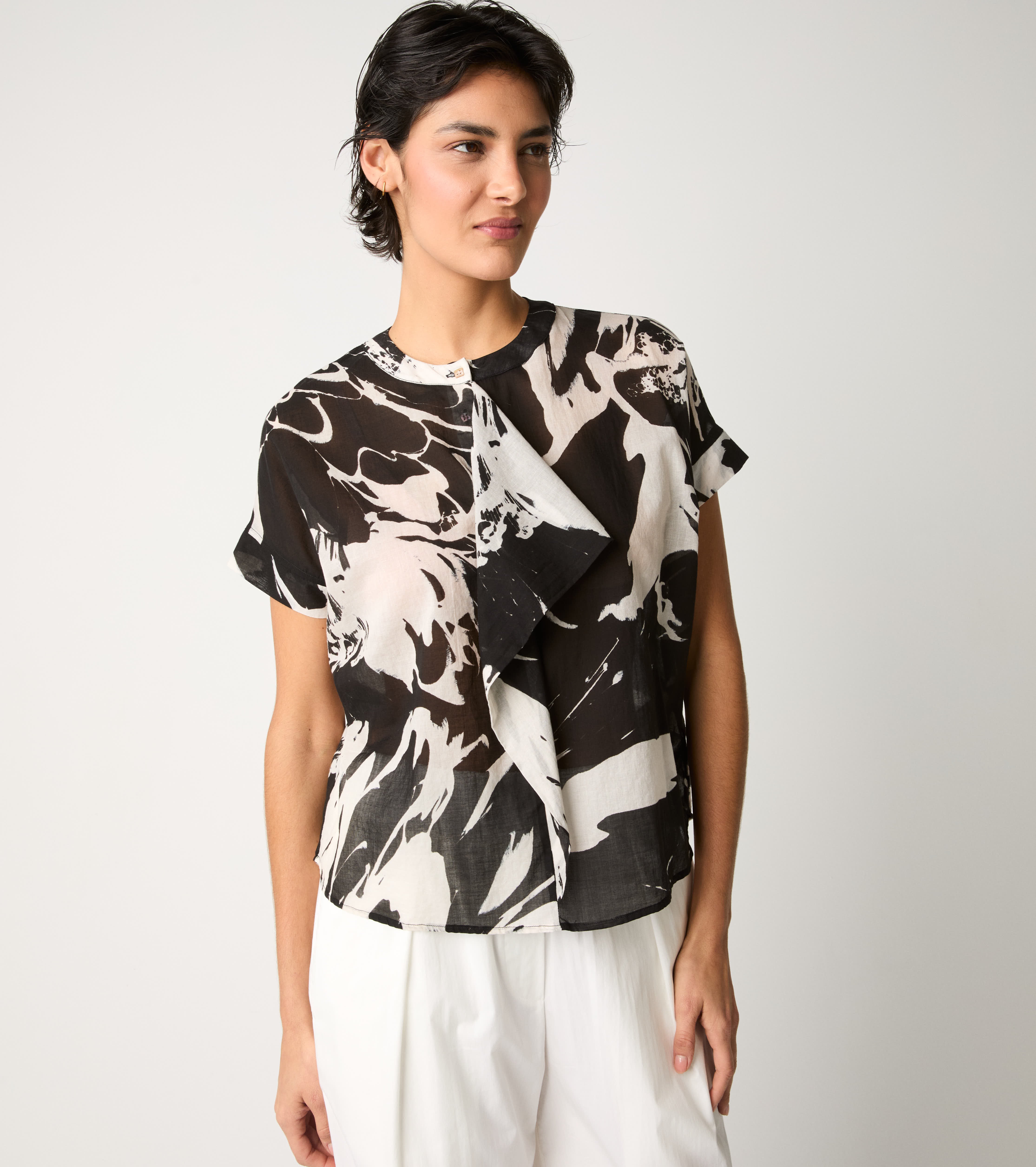Crew-neck blouse with flower ruffles