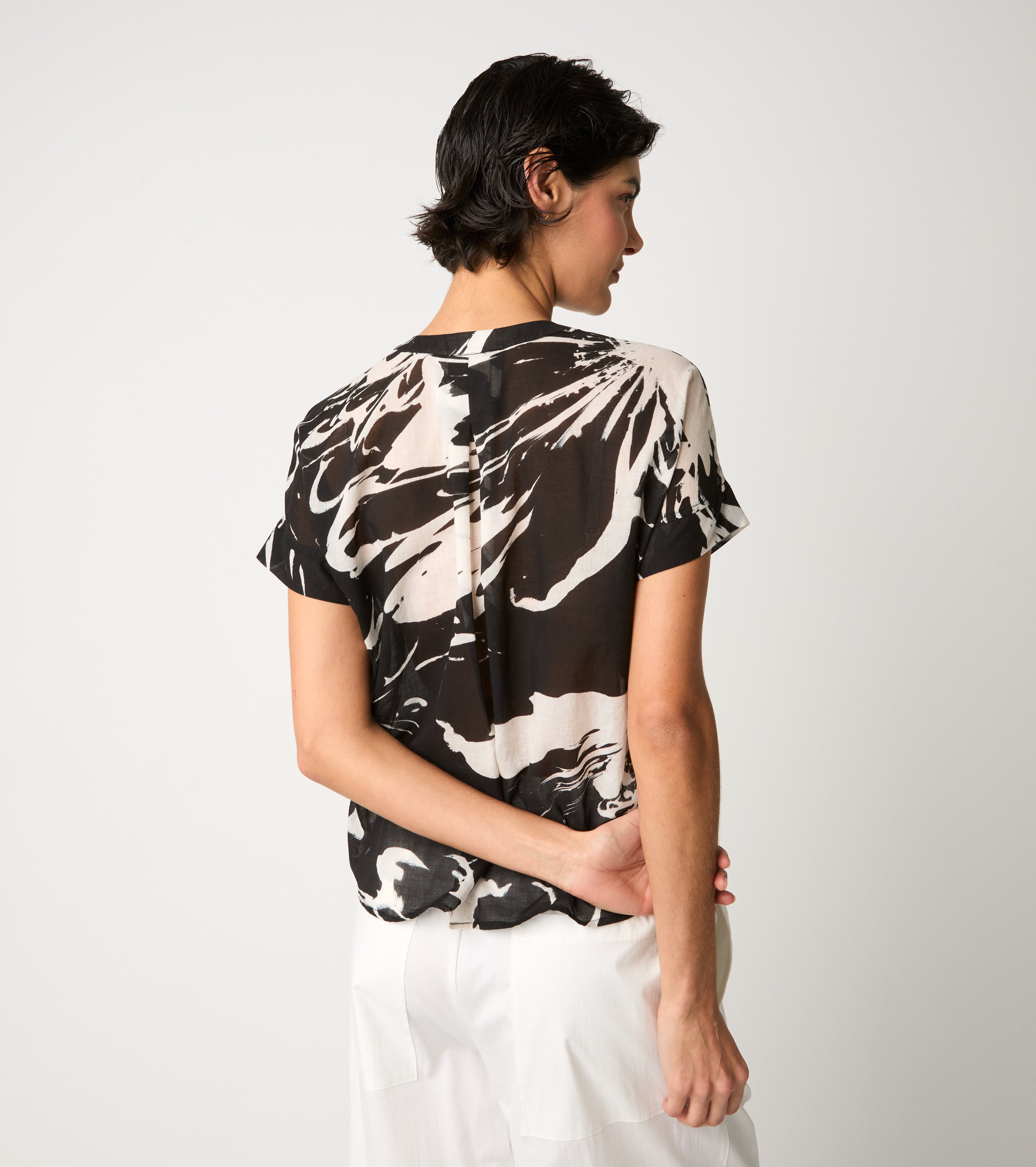 Crew-neck blouse with flower ruffles