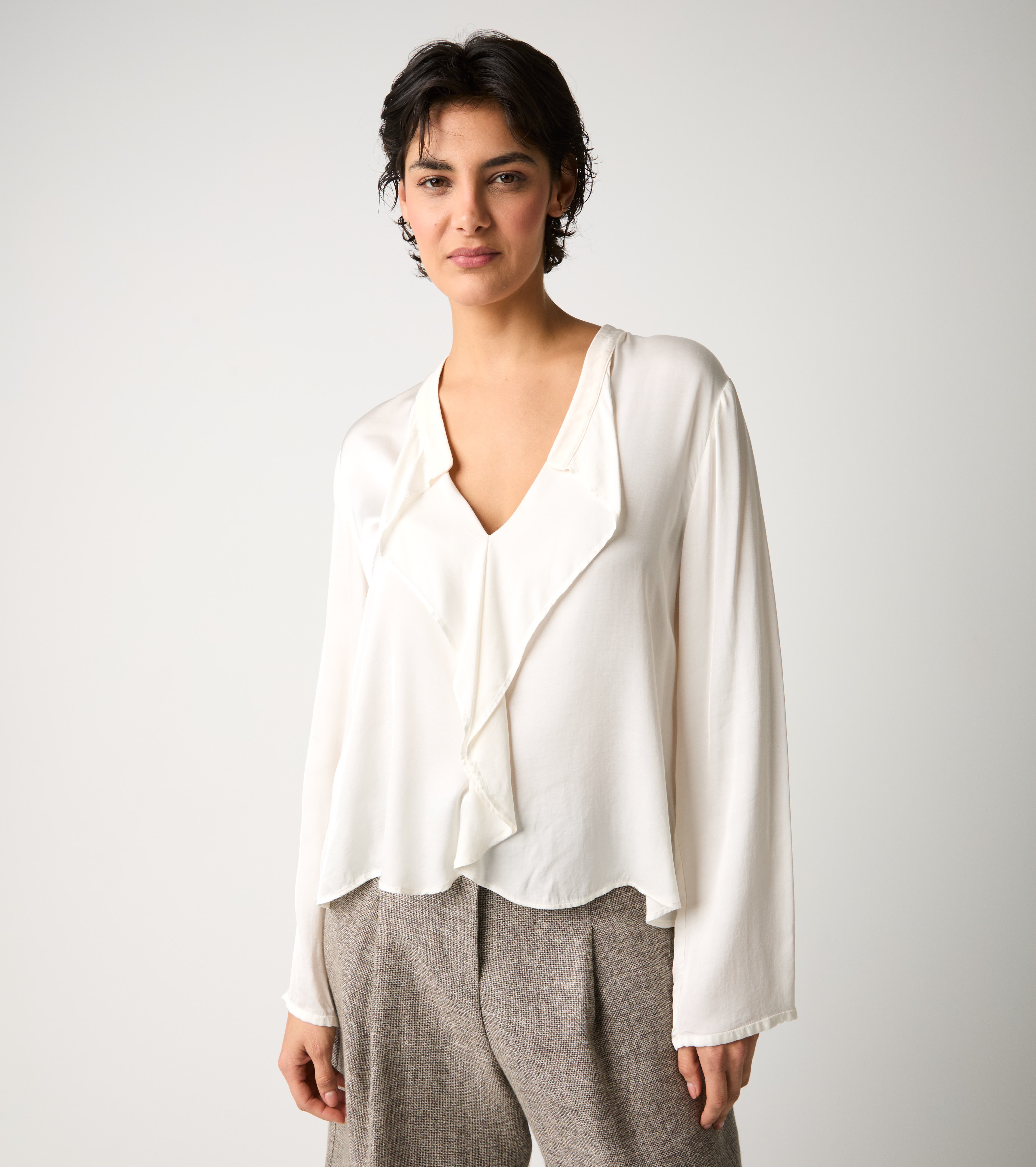 Blusa con volant e maniche lunghe salina