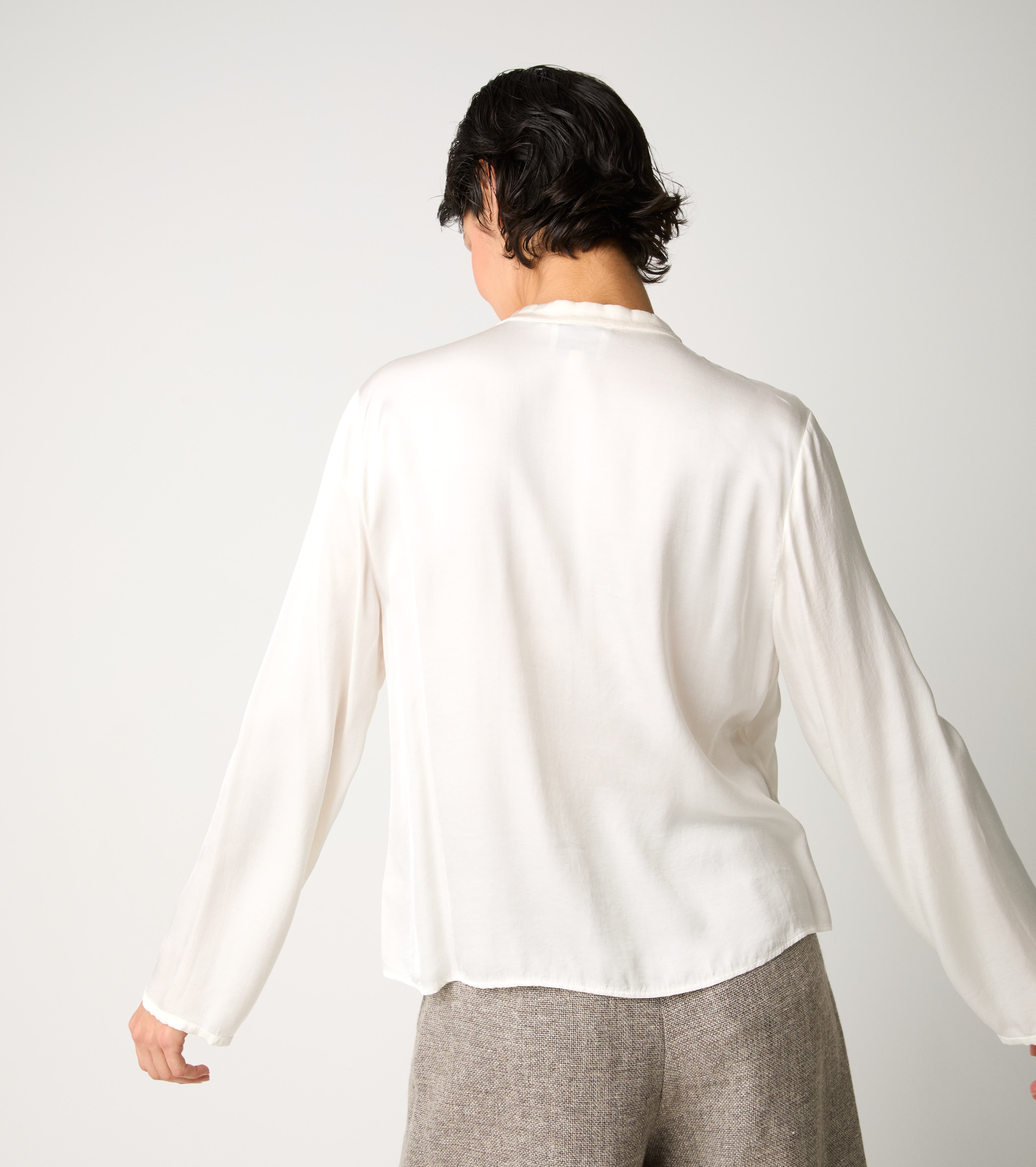 Blusa con volant e maniche lunghe salina