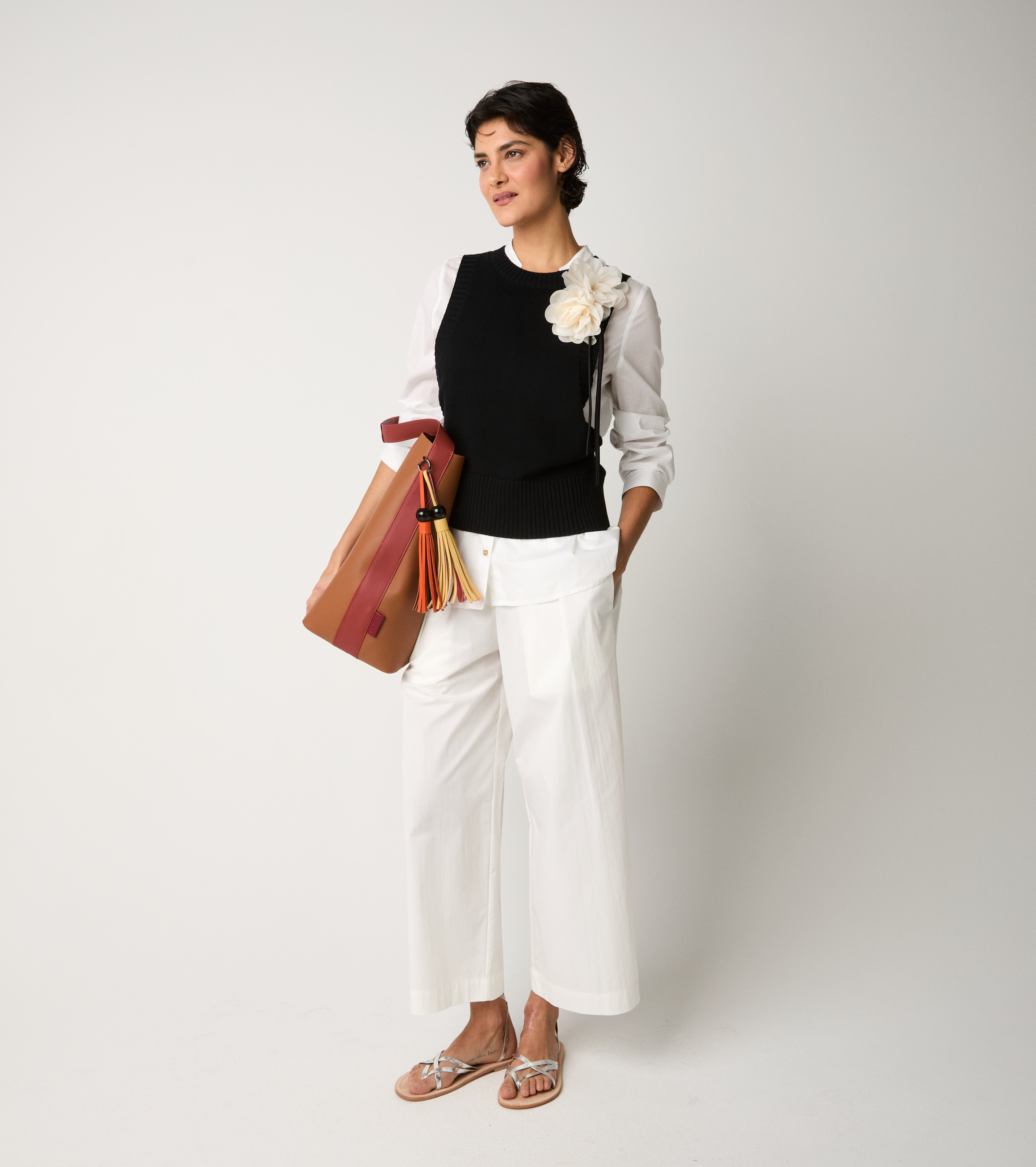 Black knitted crew-neck waistcoat